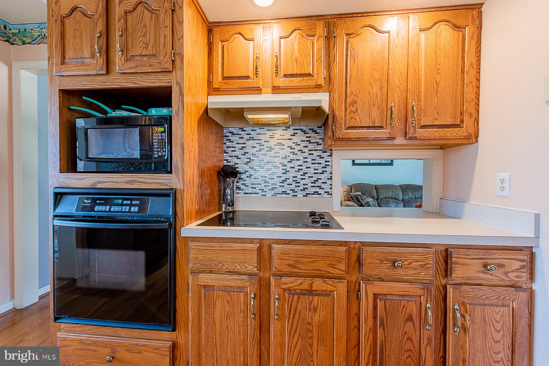 4000 Bark Hill Road Union Bridge, MD 21791 - Photo 20 of 61 a kitchen with stainless steel appliances granite countertop a refrigerator and a stove