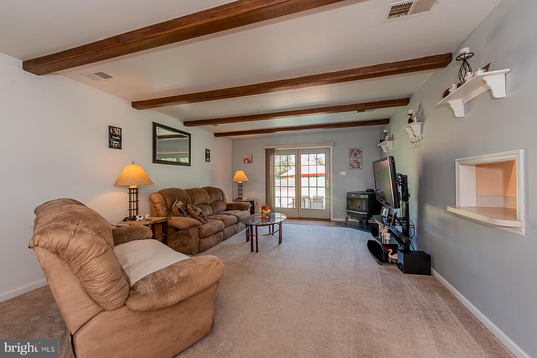 4000 Bark Hill Road Union Bridge, MD 21791 - Photo 23 of 61 a living room with furniture and a window