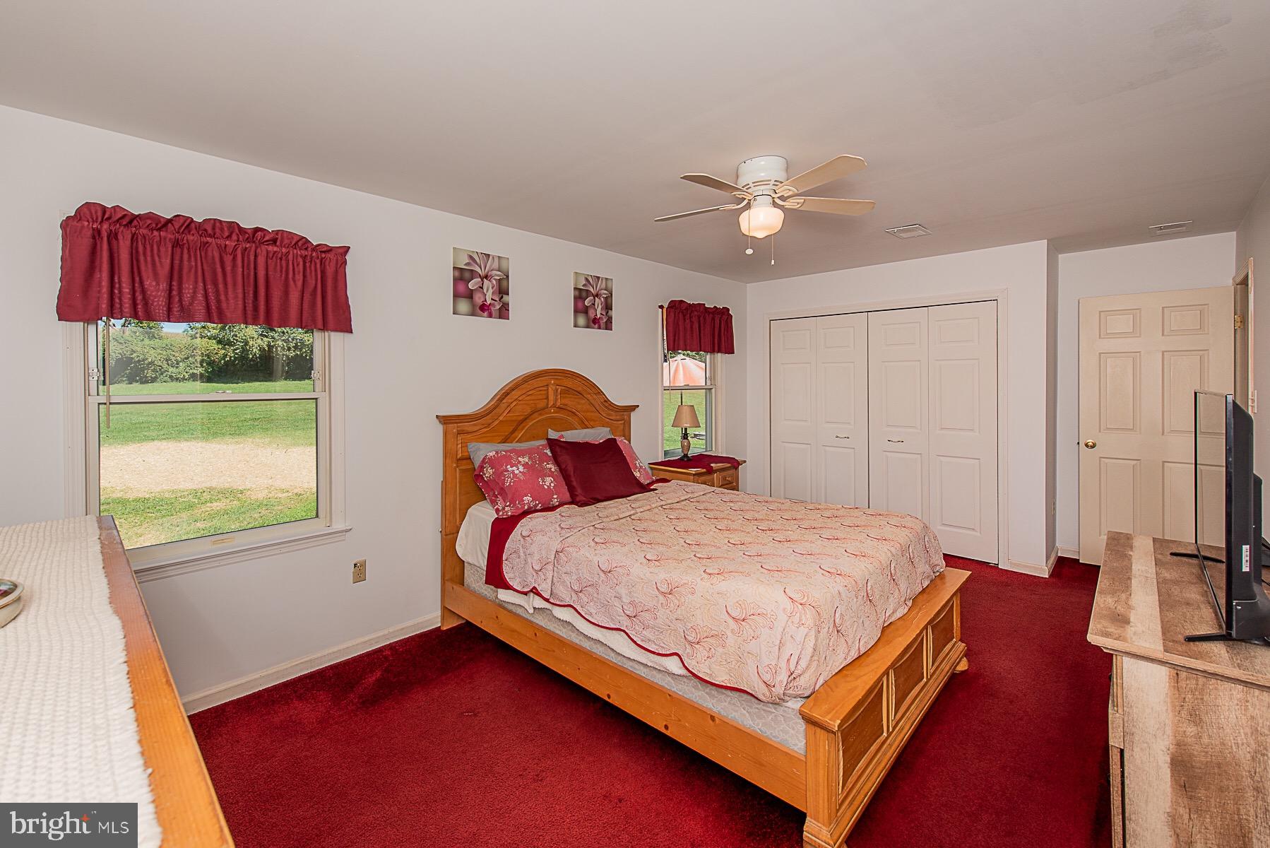 4000 Bark Hill Road Union Bridge, MD 21791 - Photo 33 of 61 a bedroom with a bed chandelier and a window