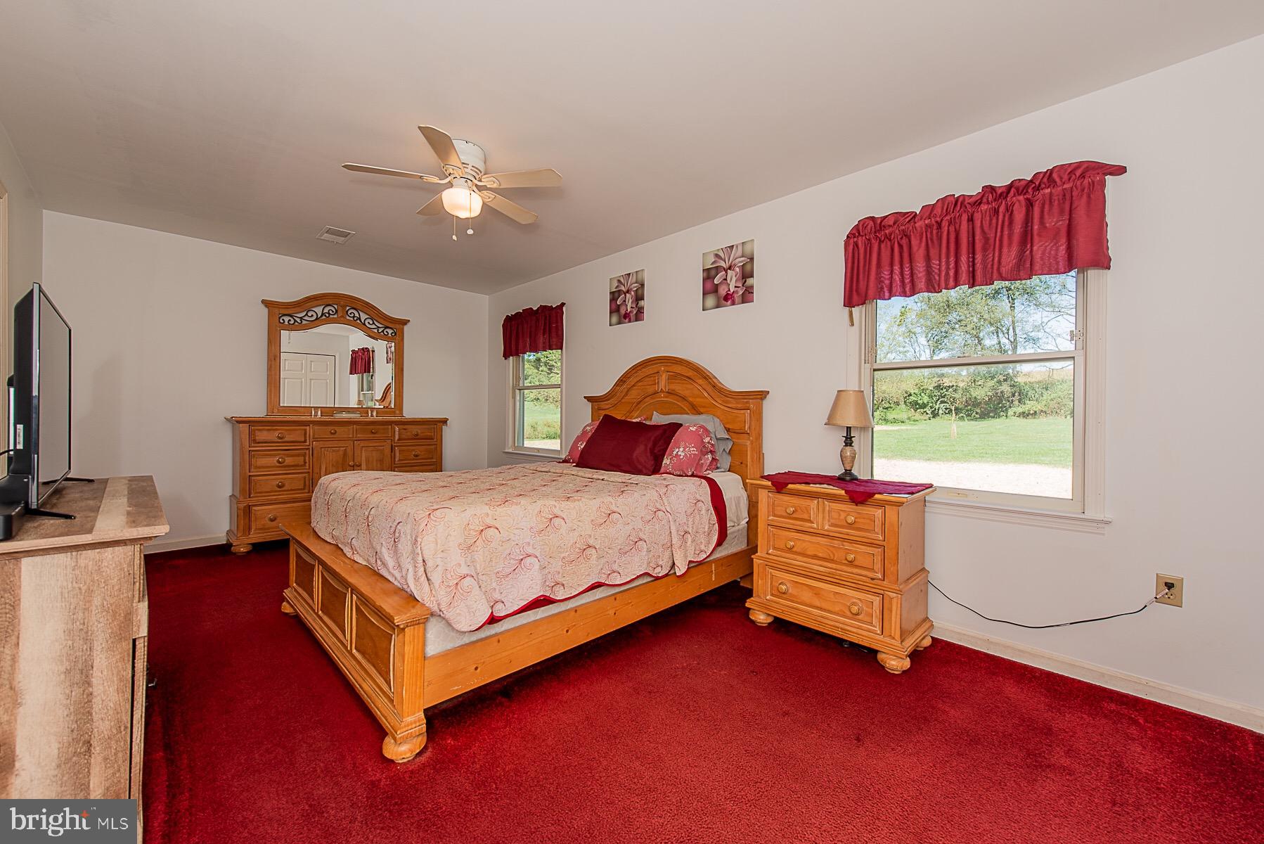 4000 Bark Hill Road Union Bridge, MD 21791 - Photo 34 of 61 a bedroom with a bed and a window