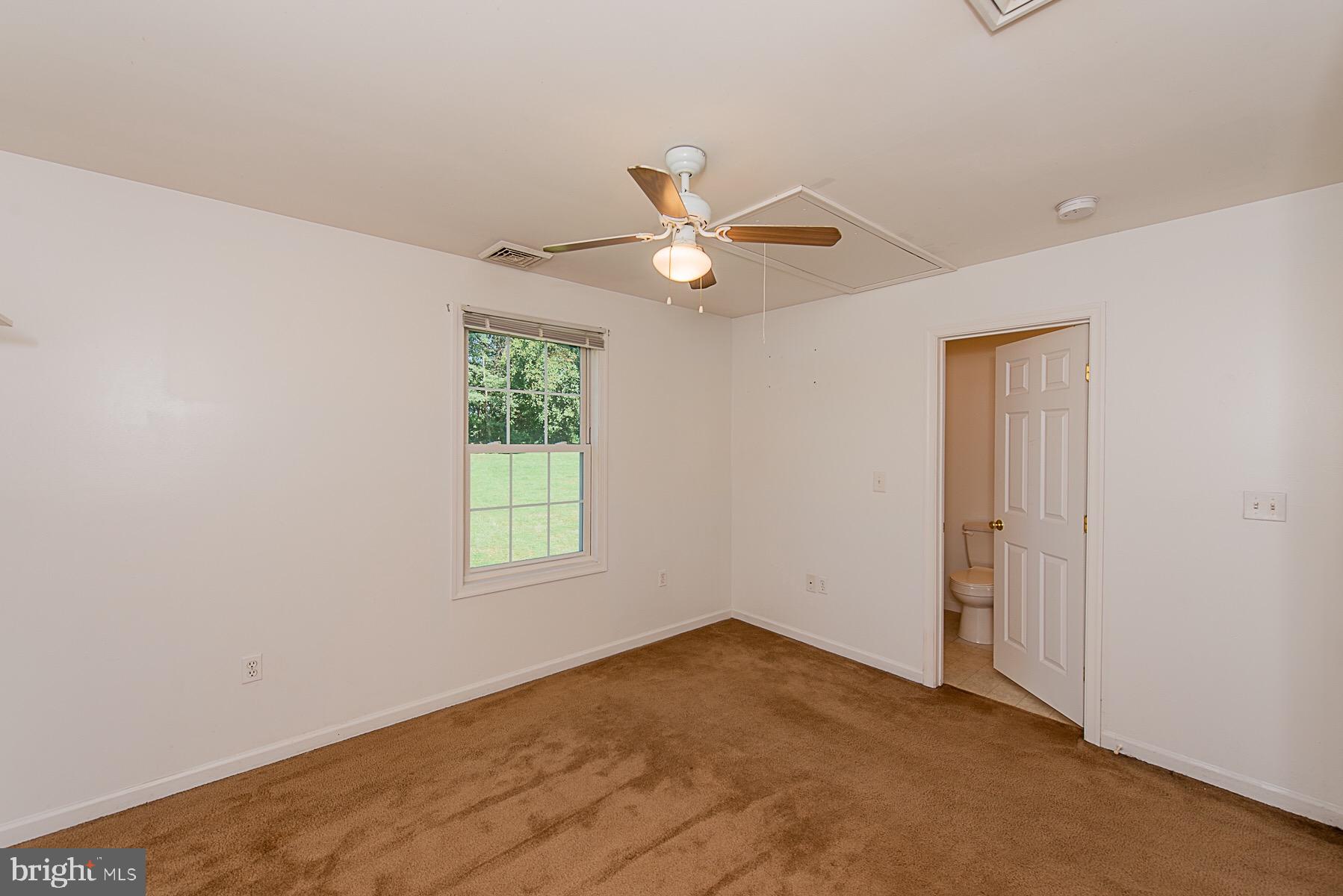 4000 Bark Hill Road Union Bridge, MD 21791 - Photo 37 of 61 an empty room with windows and fan