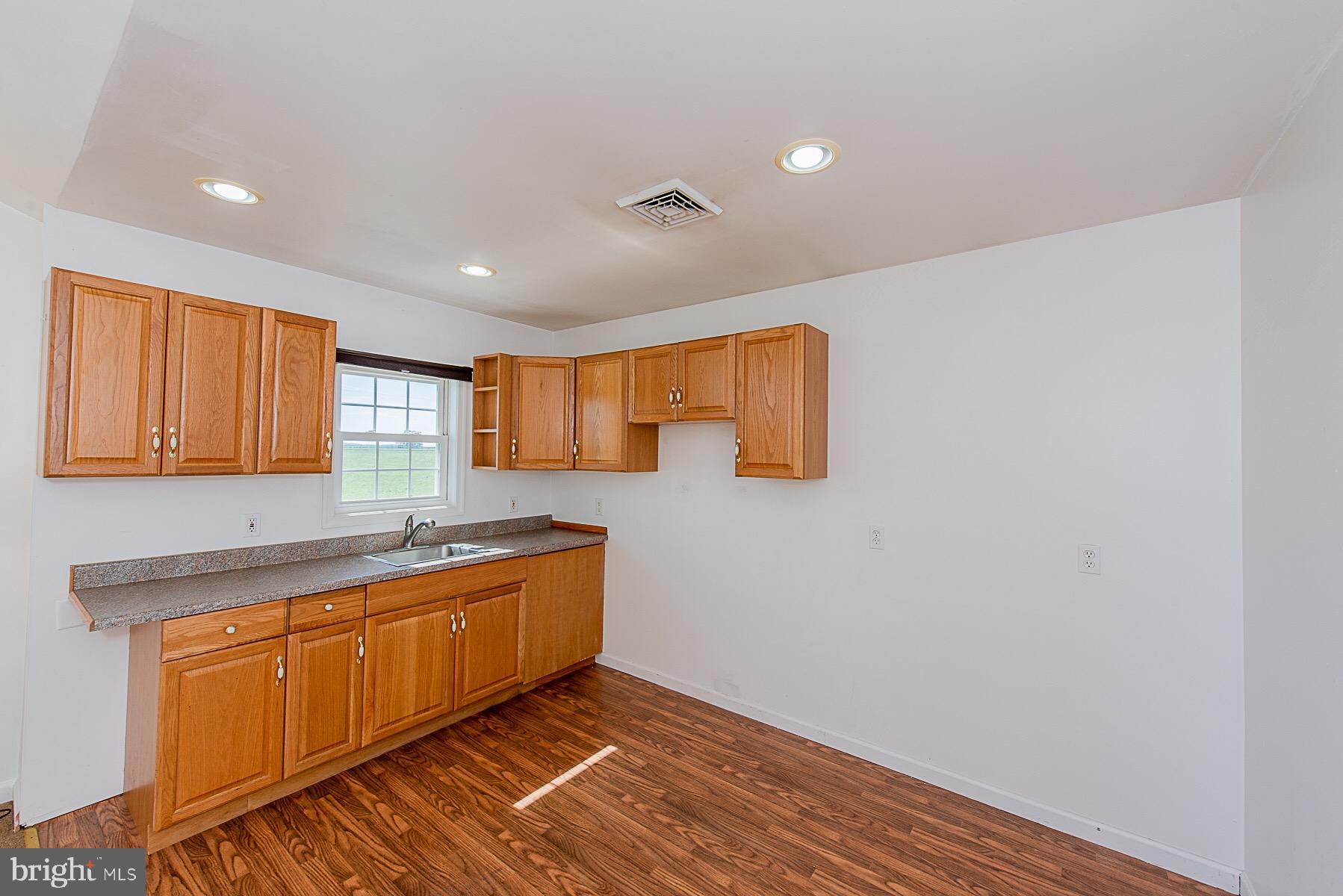 4000 Bark Hill Road Union Bridge, MD 21791 - Photo 40 of 61 a kitchen with a sink and cabinets