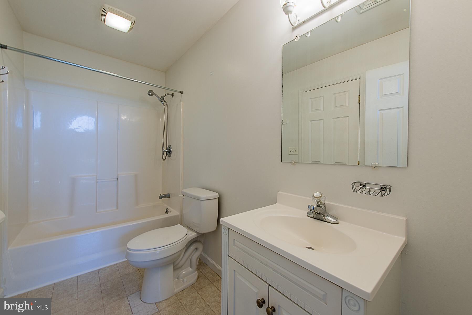 4000 Bark Hill Road Union Bridge, MD 21791 - Photo 42 of 61 a bathroom with a sink a toilet and shower