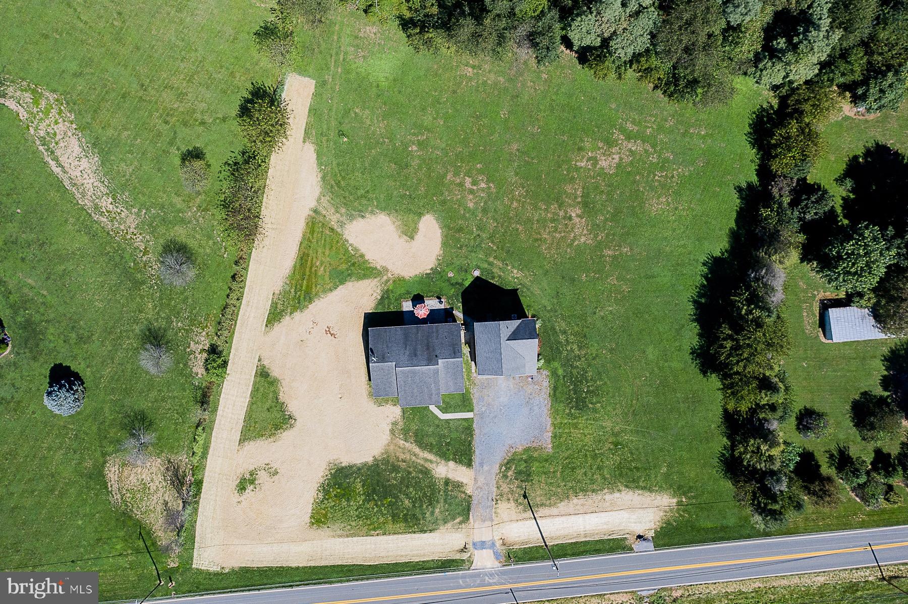4000 Bark Hill Road Union Bridge, MD 21791 - Photo 50 of 61 an aerial view of residential house with outdoor space and trees all around
