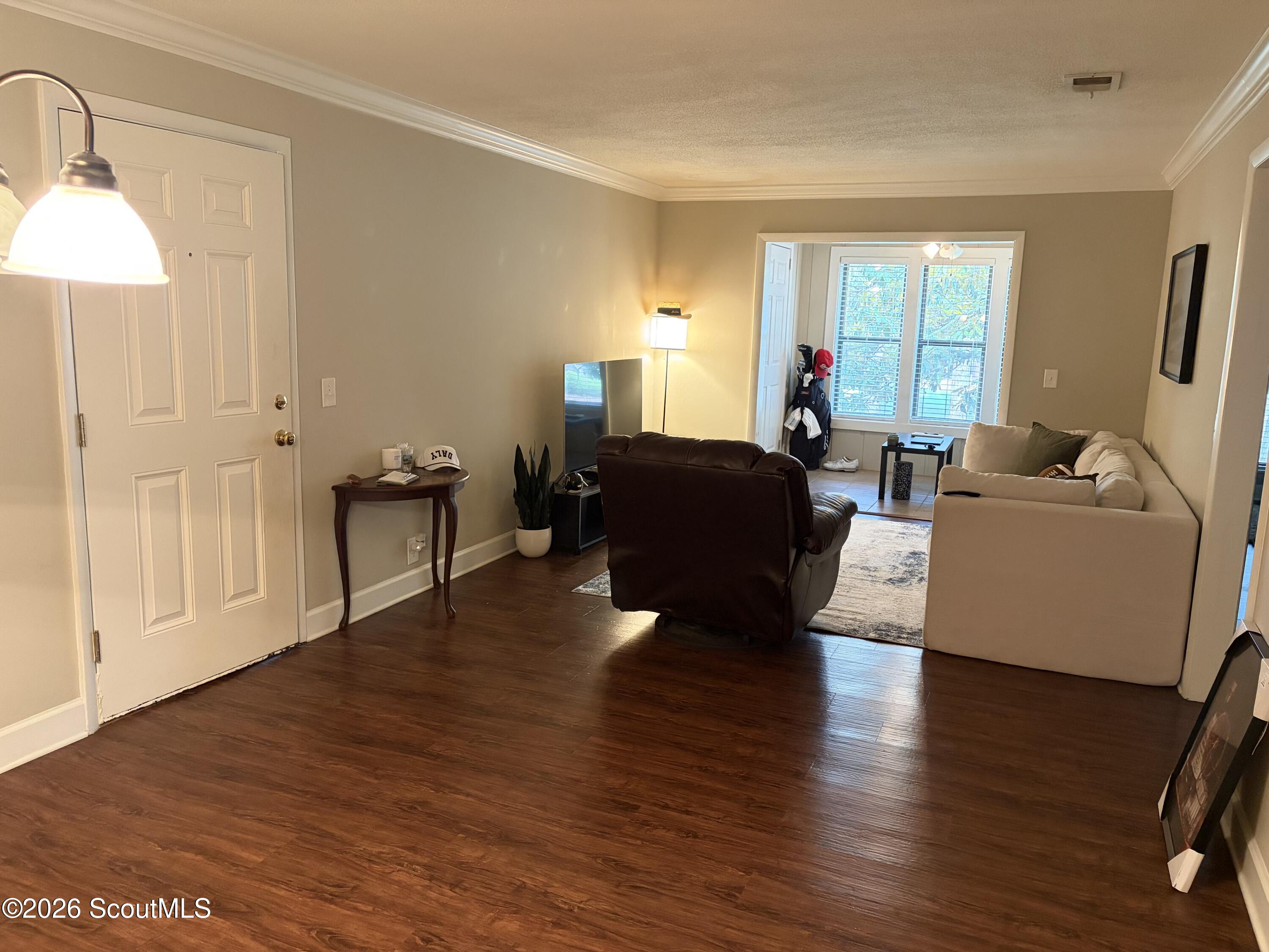 2506 Demere Road, Unit 7 St. Simons Island, GA 31522 - Photo 7 of 27 View from dining area towards living area