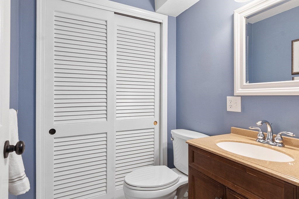512 Ridgefield Circle, Unit C Clinton, MA 01510 - Photo 12 of 28 a bathroom with a sink a toilet and shower