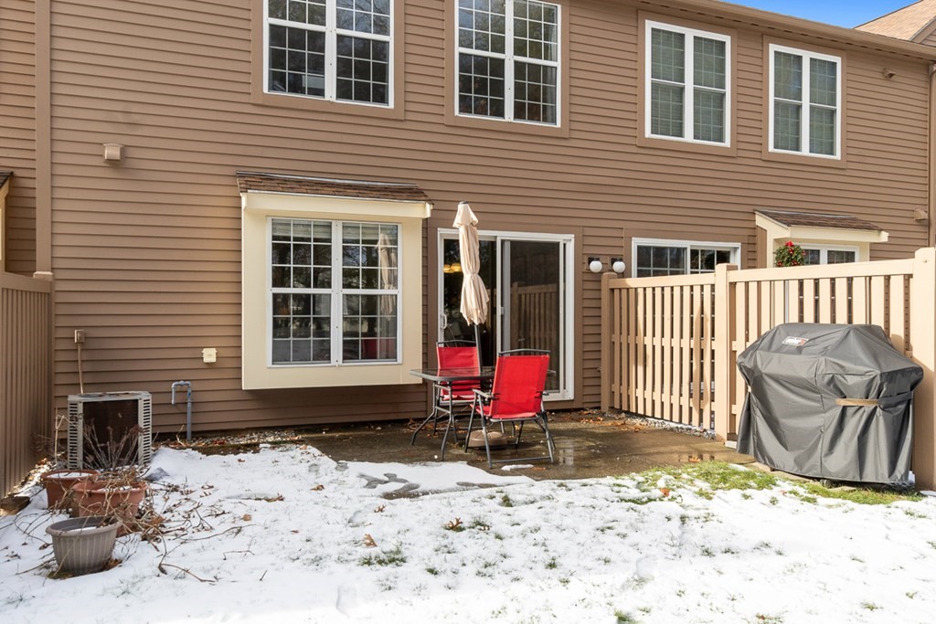 512 Ridgefield Circle, Unit C Clinton, MA 01510 - Photo 21 of 28 a view of a house with wooden fence