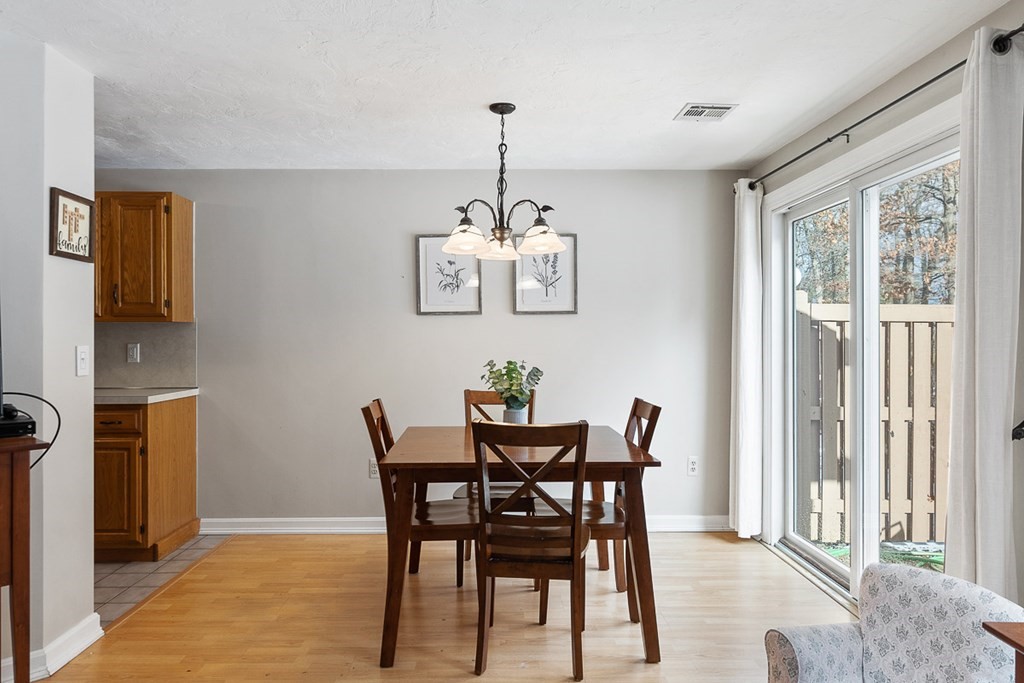 512 Ridgefield Circle, Unit C Clinton, MA 01510 - Photo 7 of 28 a dining room with furniture and window