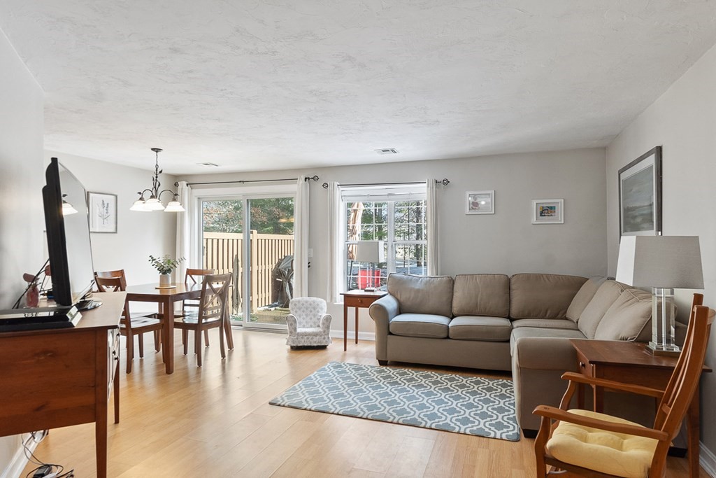 512 Ridgefield Circle, Unit C Clinton, MA 01510 - Photo 10 of 28 a living room with furniture and wooden floor