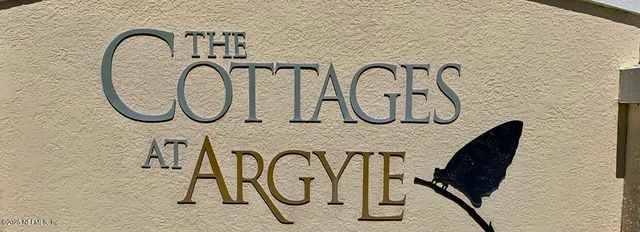 a view of a furniture with chandelier