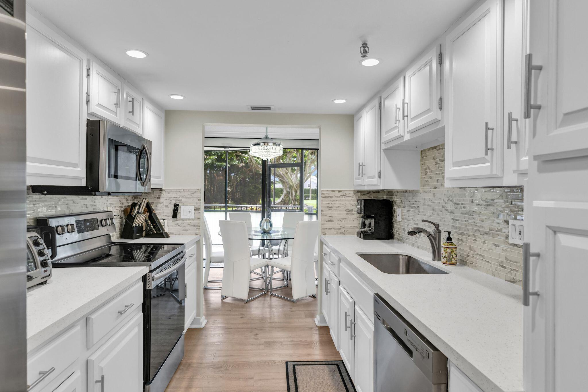 899 Jeffery Street, Unit 109 Boca Raton, FL 33487 - Photo 1 of 93 899 Jeffery 109 Kitchen 1