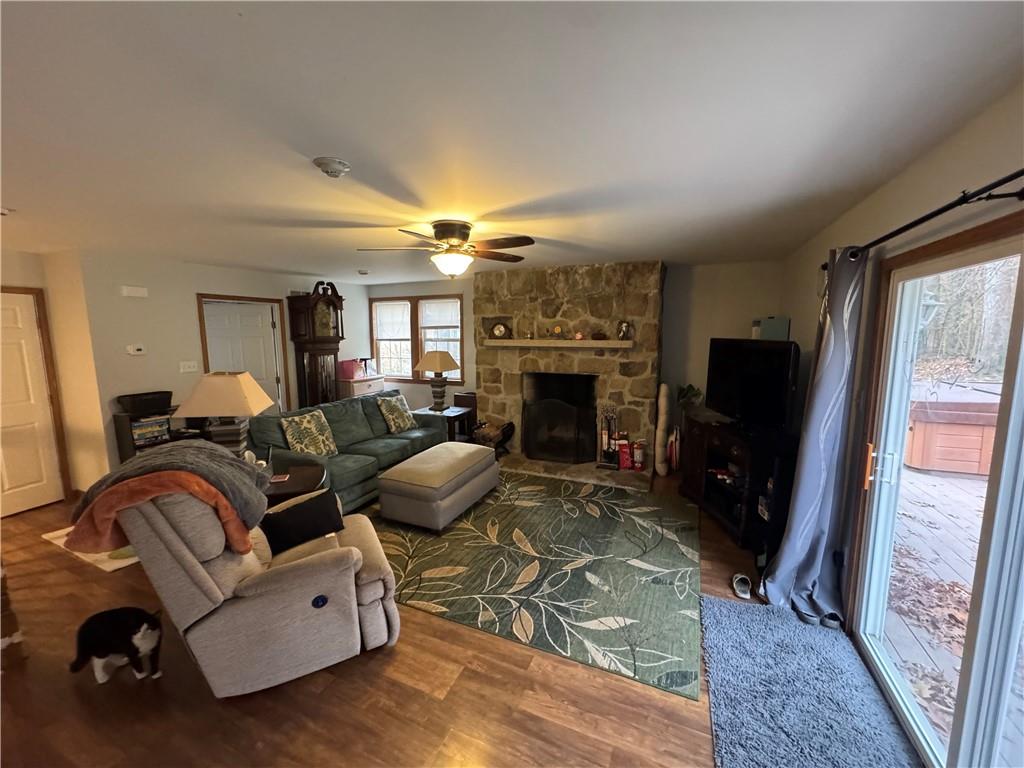 526 East River Road Edinburg, PA 16116 - Photo 12 of 39 a living room with furniture and a fireplace