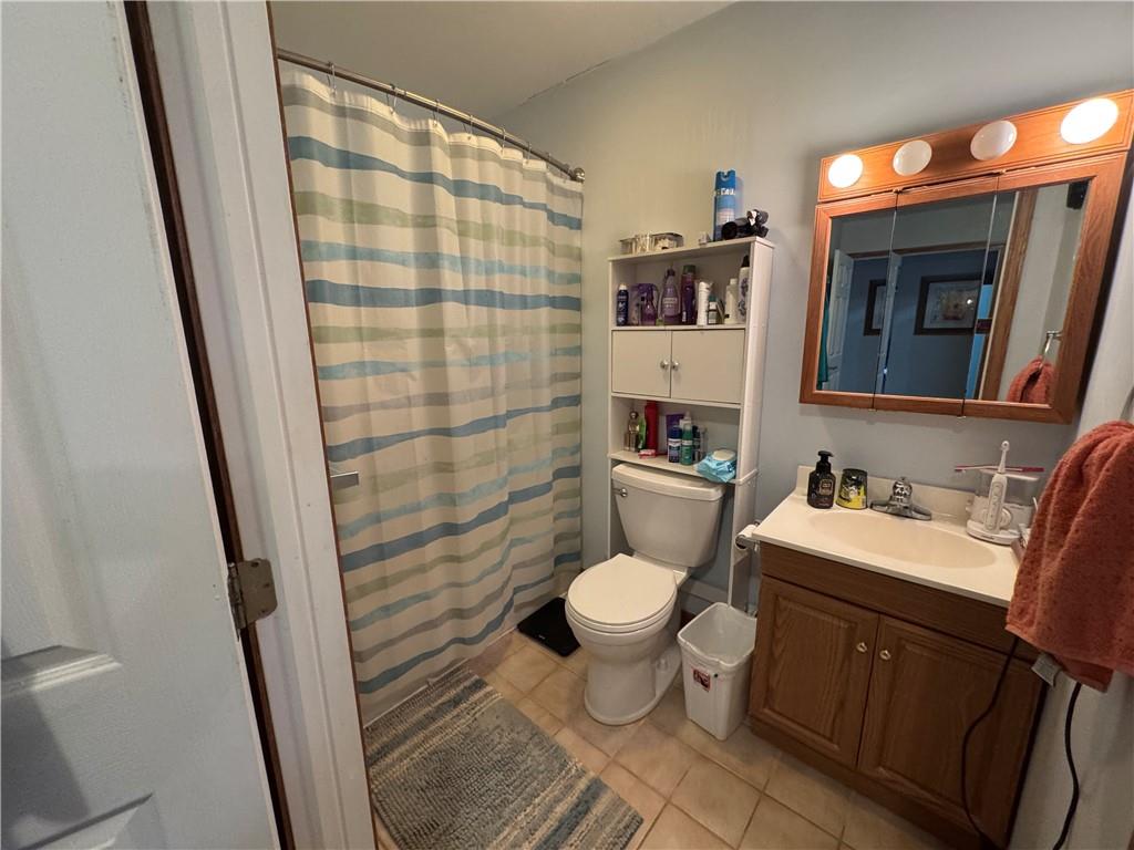 526 East River Road Edinburg, PA 16116 - Photo 15 of 39 a bathroom with a sink toilet and shower