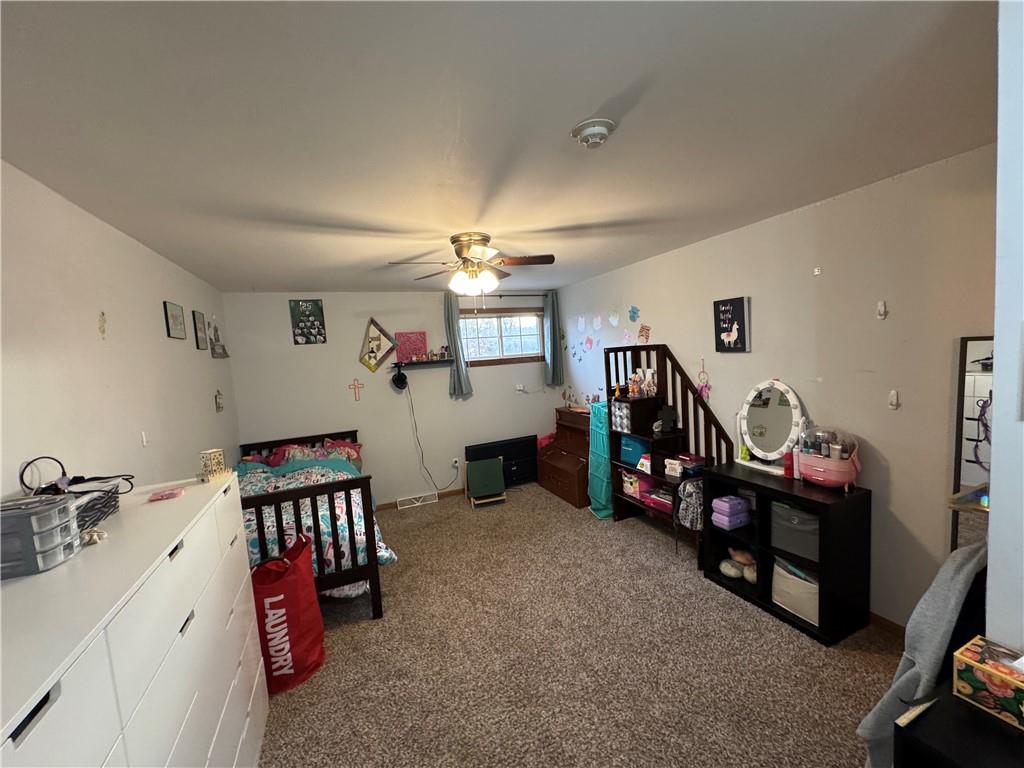 526 East River Road Edinburg, PA 16116 - Photo 16 of 39 a view of a bedroom with gym equipment