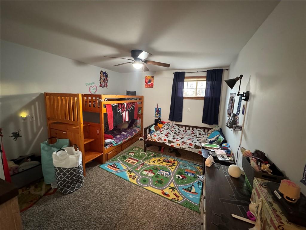 526 East River Road Edinburg, PA 16116 - Photo 18 of 39 a bed room with furniture and a window