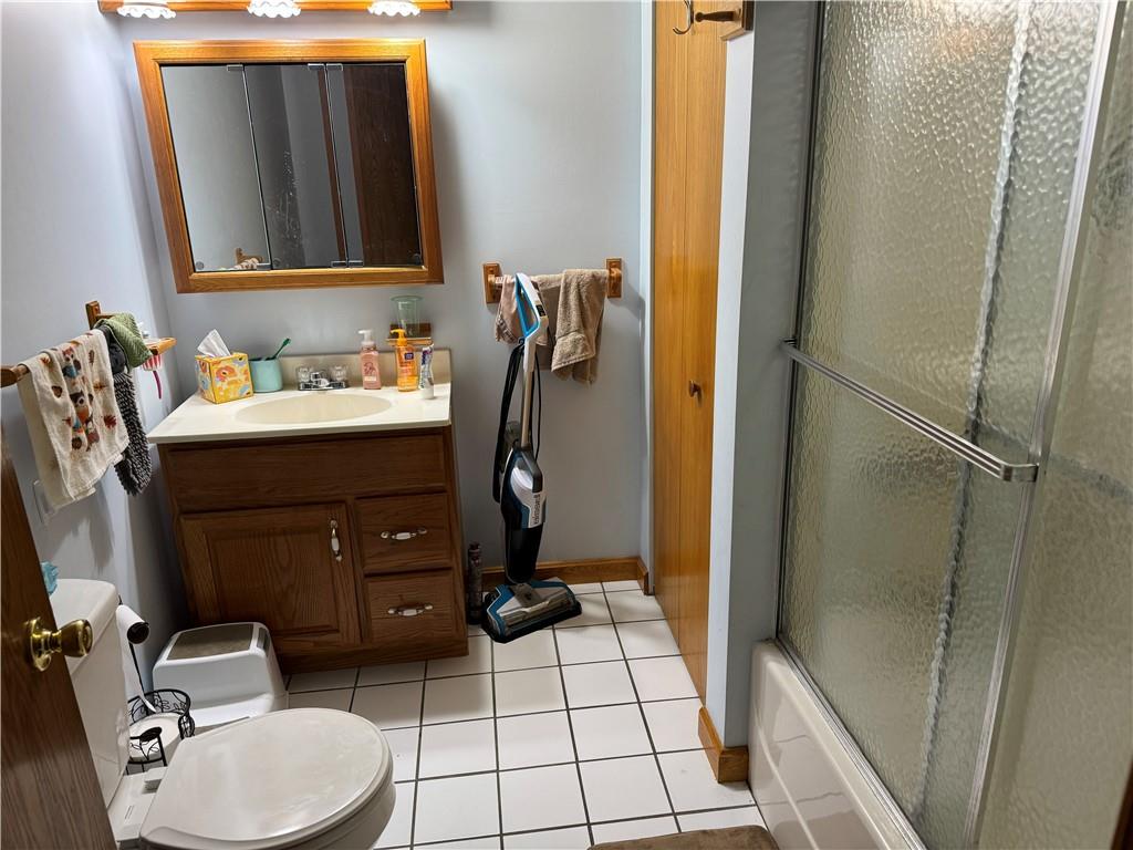 526 East River Road Edinburg, PA 16116 - Photo 21 of 39 a bathroom with a sink toilet and shower