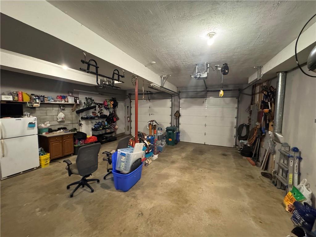 526 East River Road Edinburg, PA 16116 - Photo 30 of 39 a view of a room with gym equipment