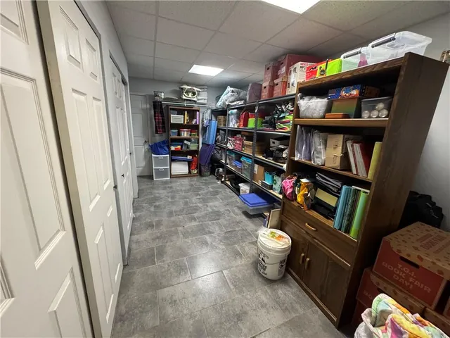 a room with water heater and storage