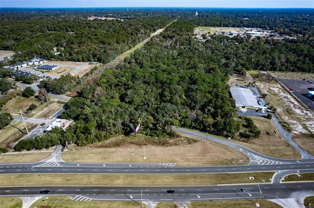 441 West Anthony Road Ocala, FL 34475 - Photo 8 of 19 a view of a house with a yard