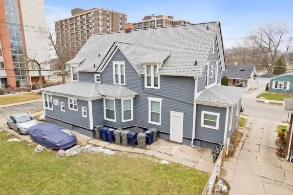 a view of a white building among the ocean