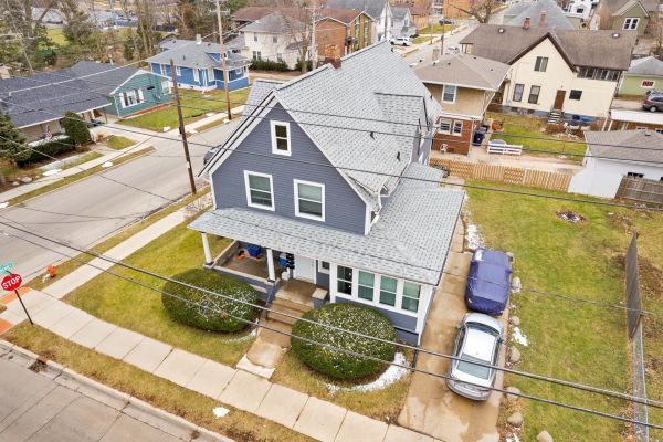 96 South Crystal Street Elgin, IL 60123 - Photo 4 of 8 an aerial view of residential houses with yard