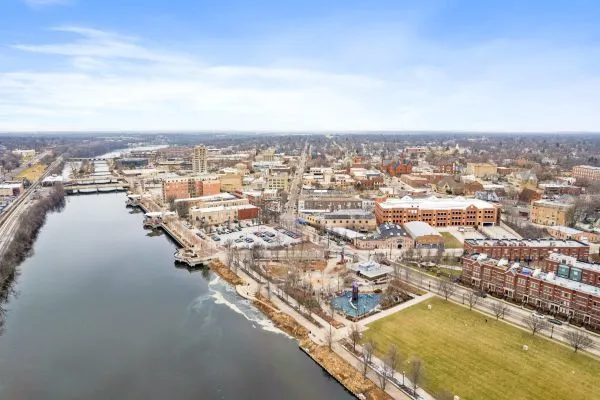 an aerial view of residential building and lake