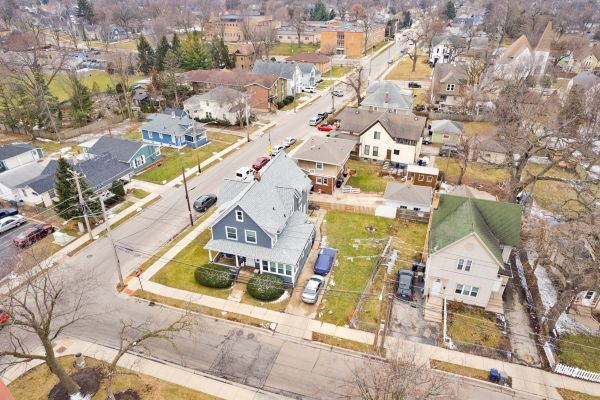 96 South Crystal Street Elgin, IL 60123 - Photo 8 of 8 an aerial view of a house with a swimming pool