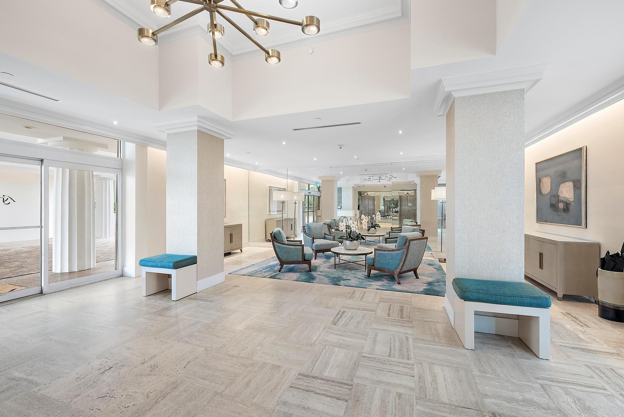 1801 South Flagler Drive, Unit 1206 West Palm Beach, FL 33401 - Photo 19 of 20 a living room with furniture and a table