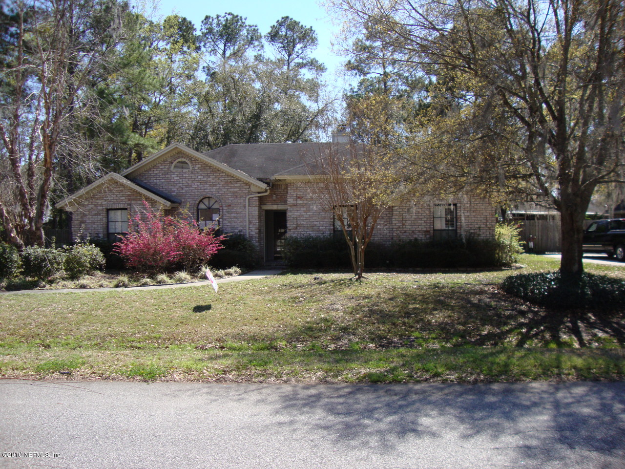 3100 Nautilus Road Middleburg, FL 32068 - Photo 1 of 1 a front view of a house with a yard and garage