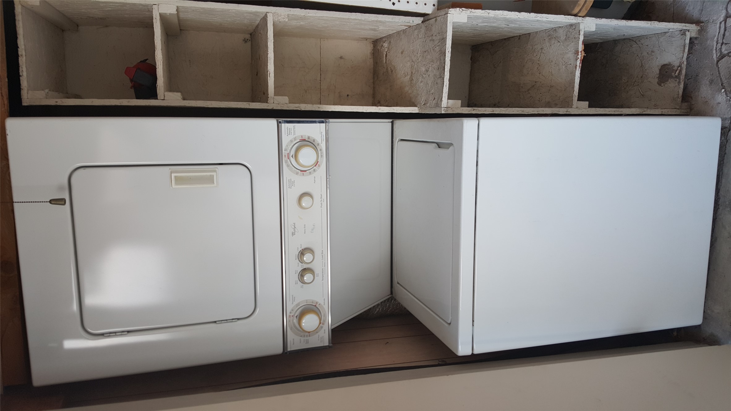 2500 Burleson Road, Unit 221 Austin, TX 78741 - Photo 10 of 18 Laundry area featuring stacked washer / dryer