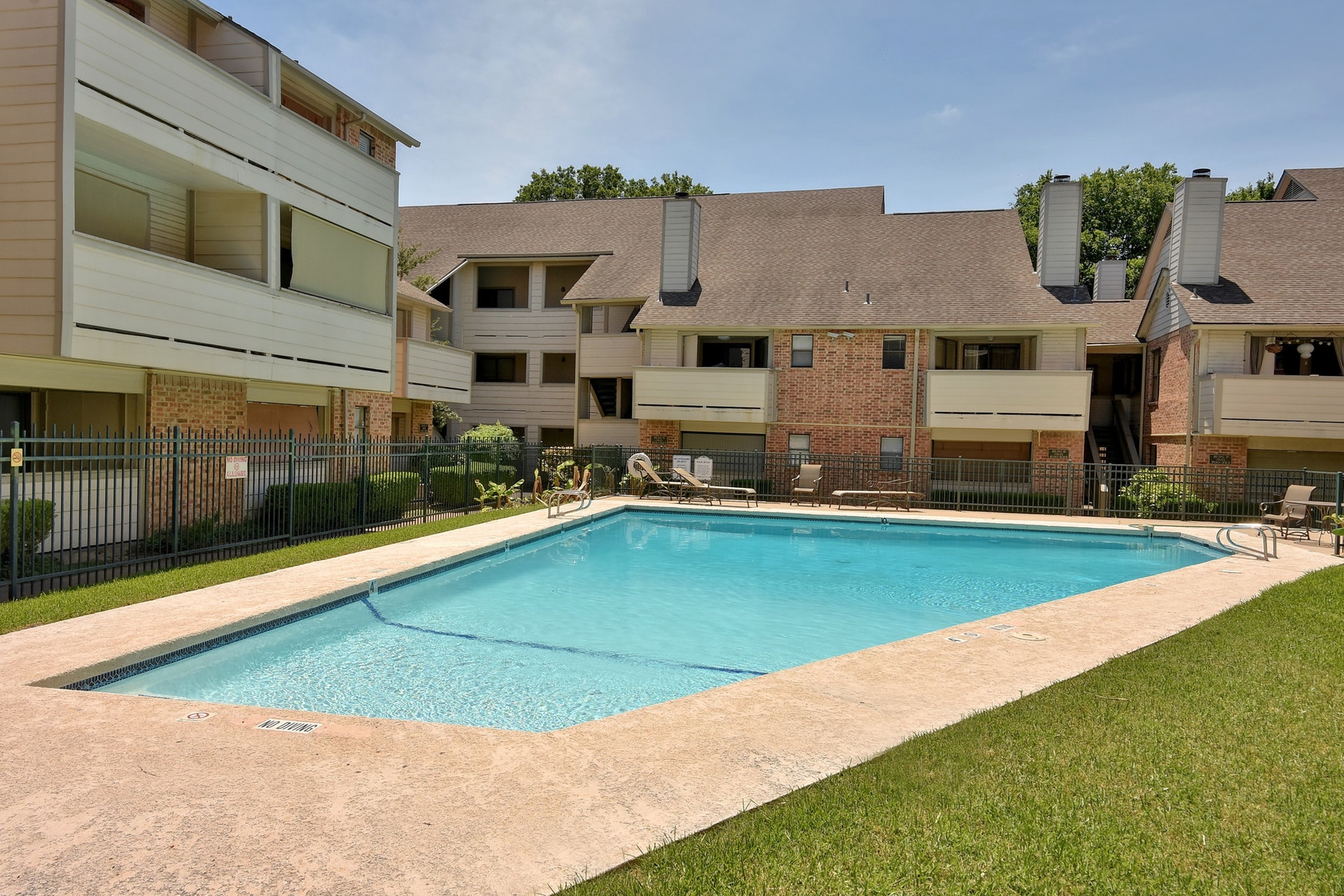 2500 Burleson Road, Unit 221 Austin, TX 78741 - Photo 12 of 18 Community pool featuring a patio