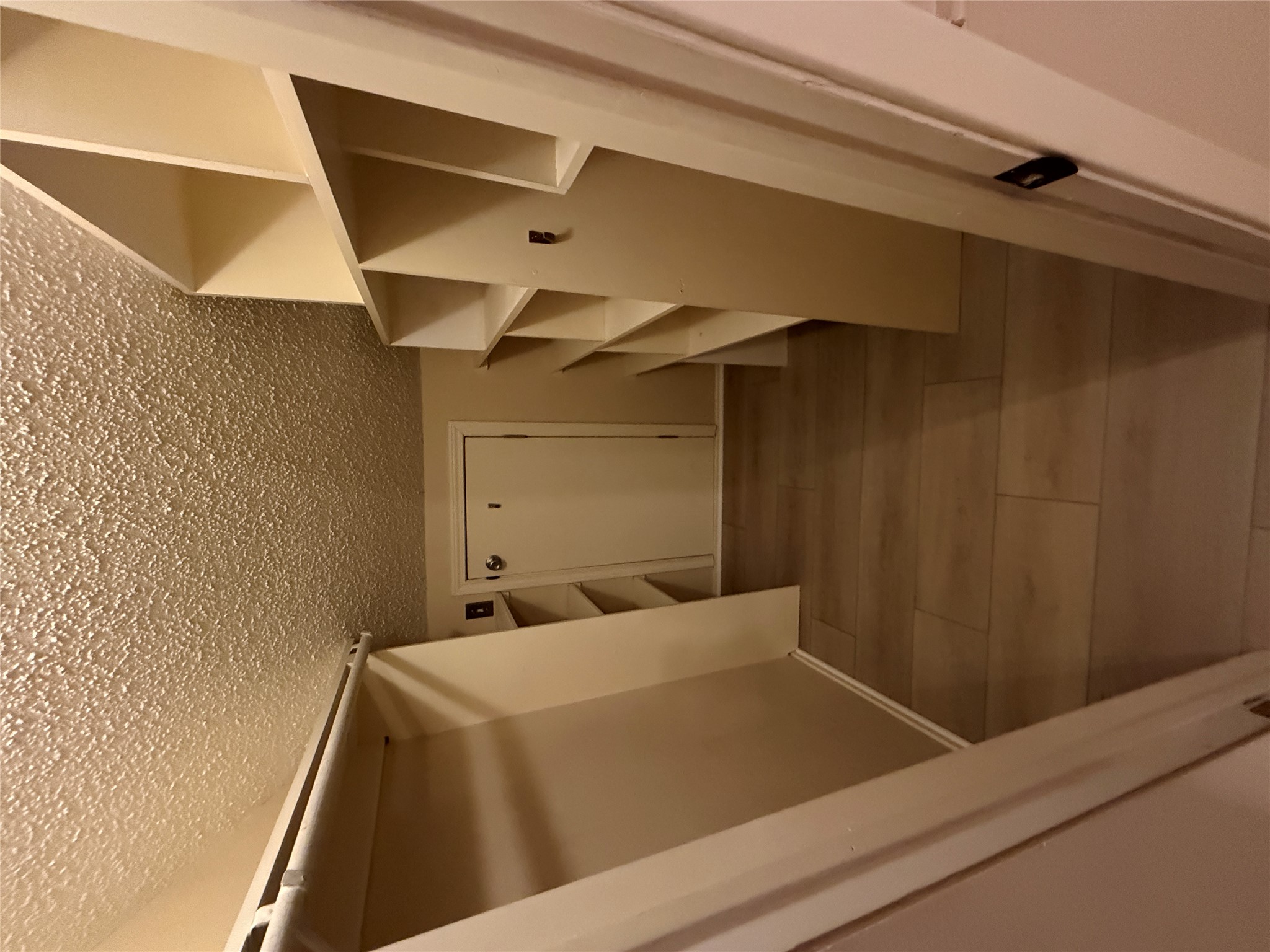 2500 Burleson Road, Unit 221 Austin, TX 78741 - Photo 7 of 18 Walk in closet with light wood-style floors