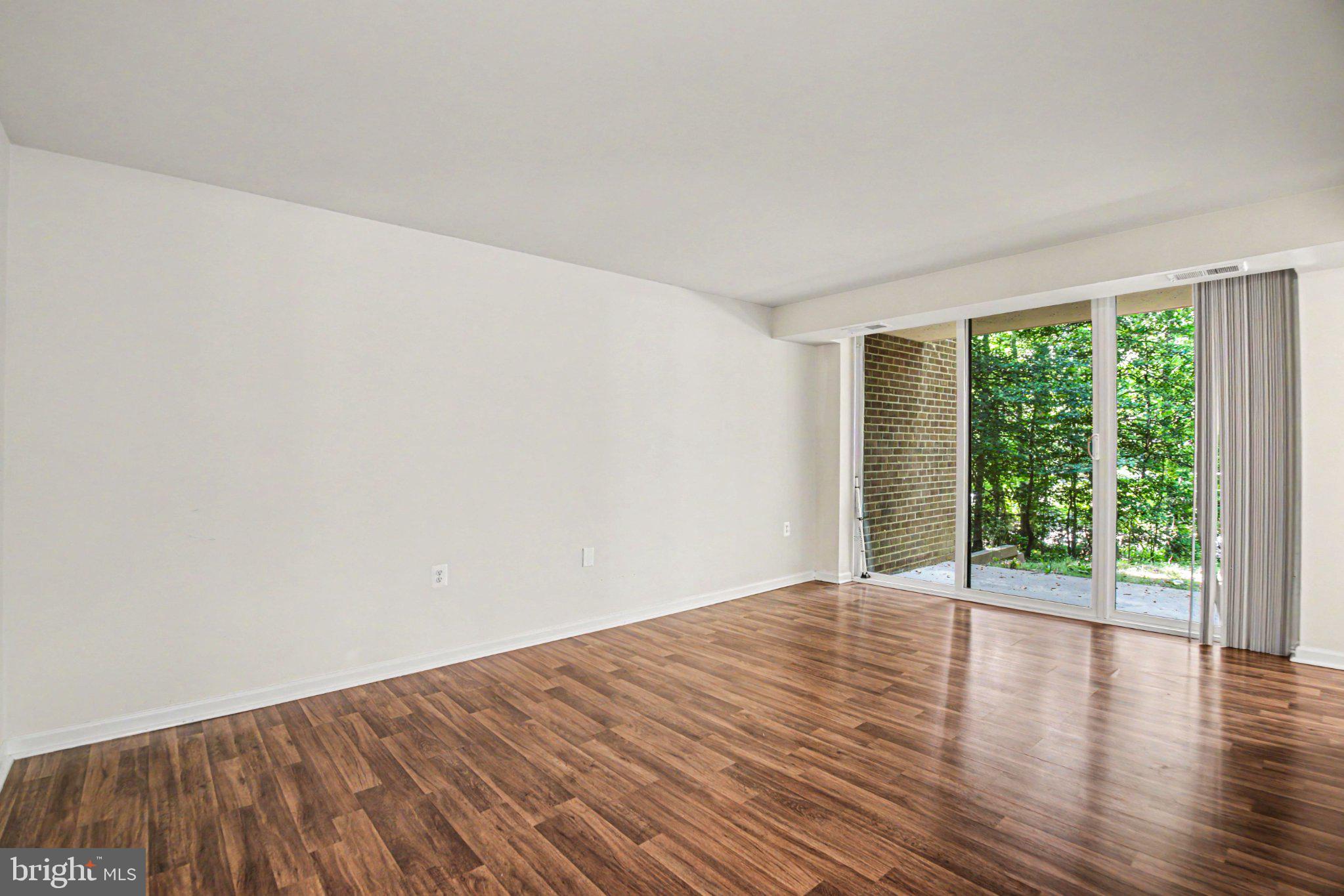 1417 Northgate Square, Unit 1A Reston, VA 20190 - Photo 6 of 24 Bright, airy space with nature views.