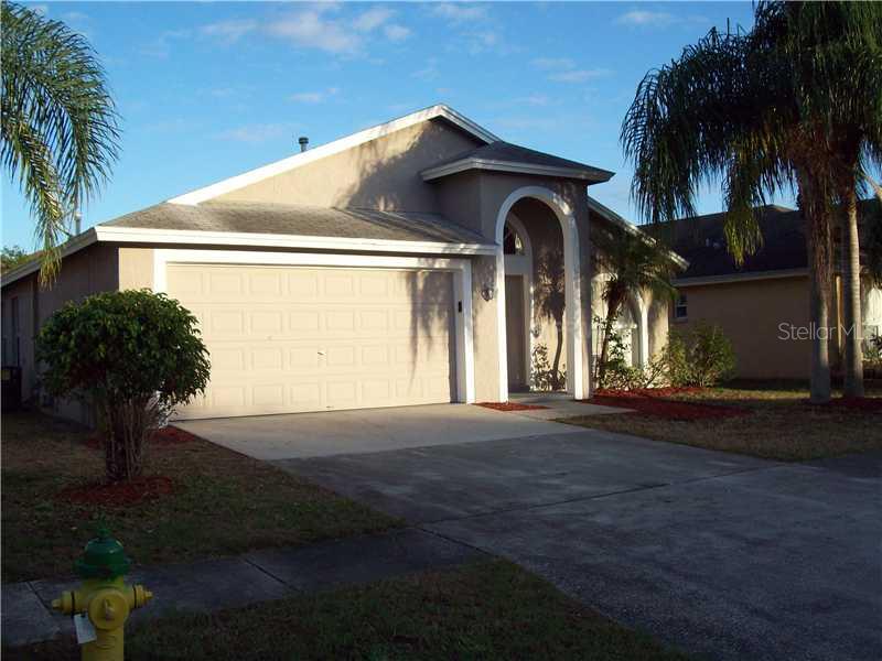 1916 Bridgehampton Place Brandon, FL 33511 - Photo 1 of 1 a house view with a garden space