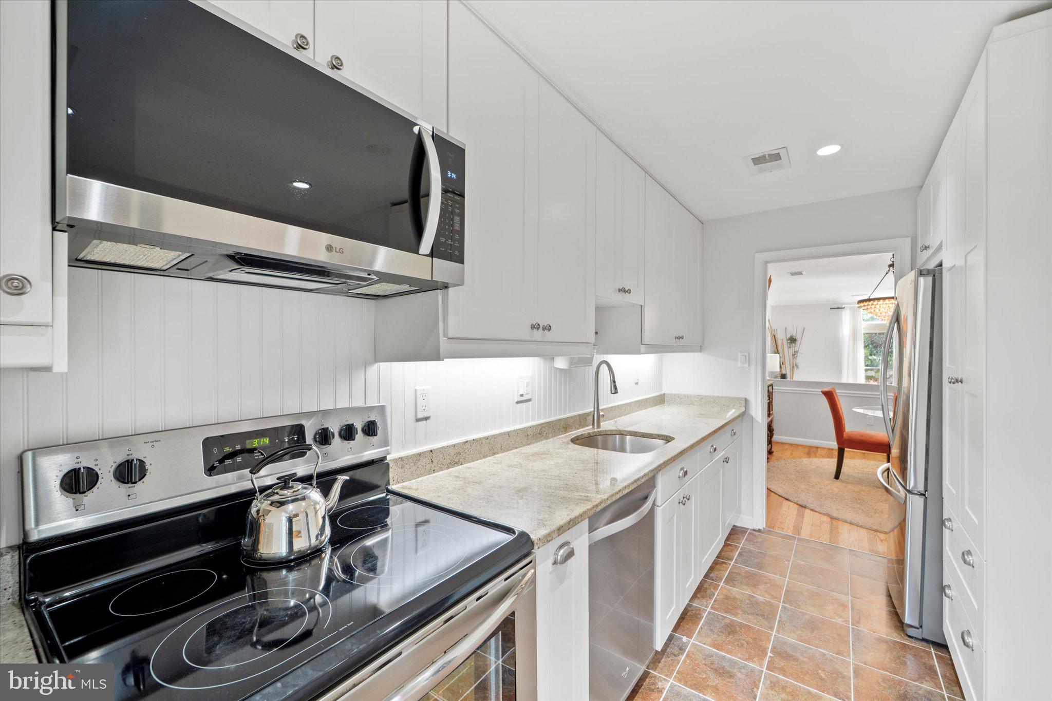 466 West Glebe Road Alexandria, VA 22305 - Photo 8 of 36 Sleek kitchen with stainless appliances