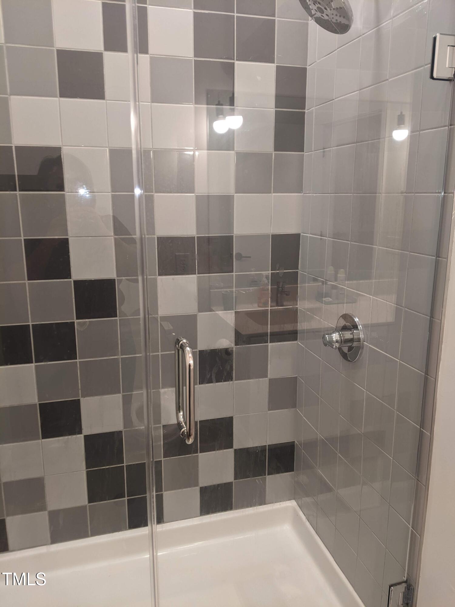 600 South Duke Street, Unit 11 Durham, NC 27701 - Photo 14 of 16 a bathroom with a shower