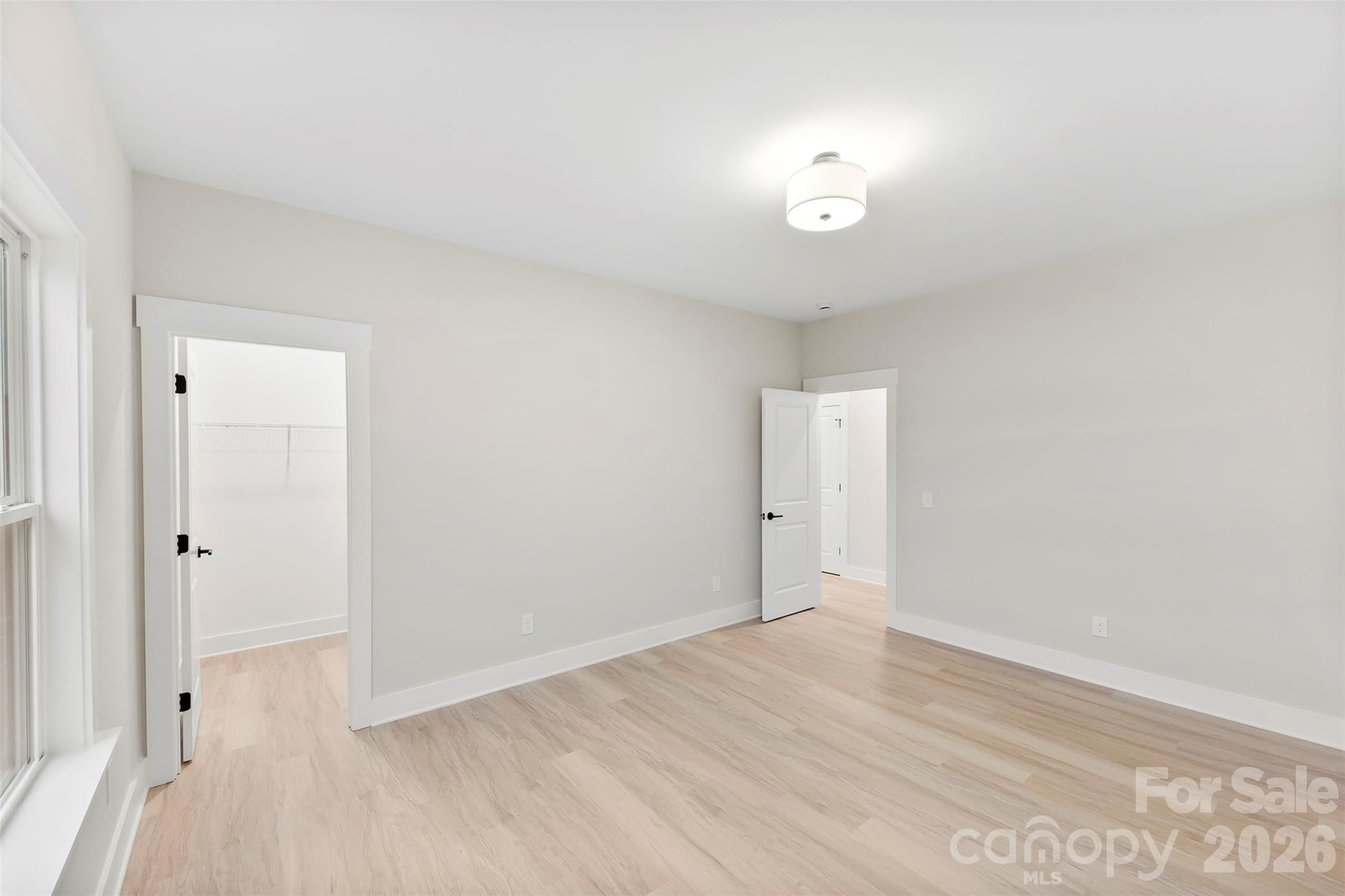 551 Perry Road Troutman, NC 28166 - Photo 40 of 47 wooden floor in an empty room