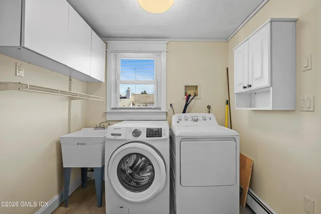 a utility room with dryer and washer