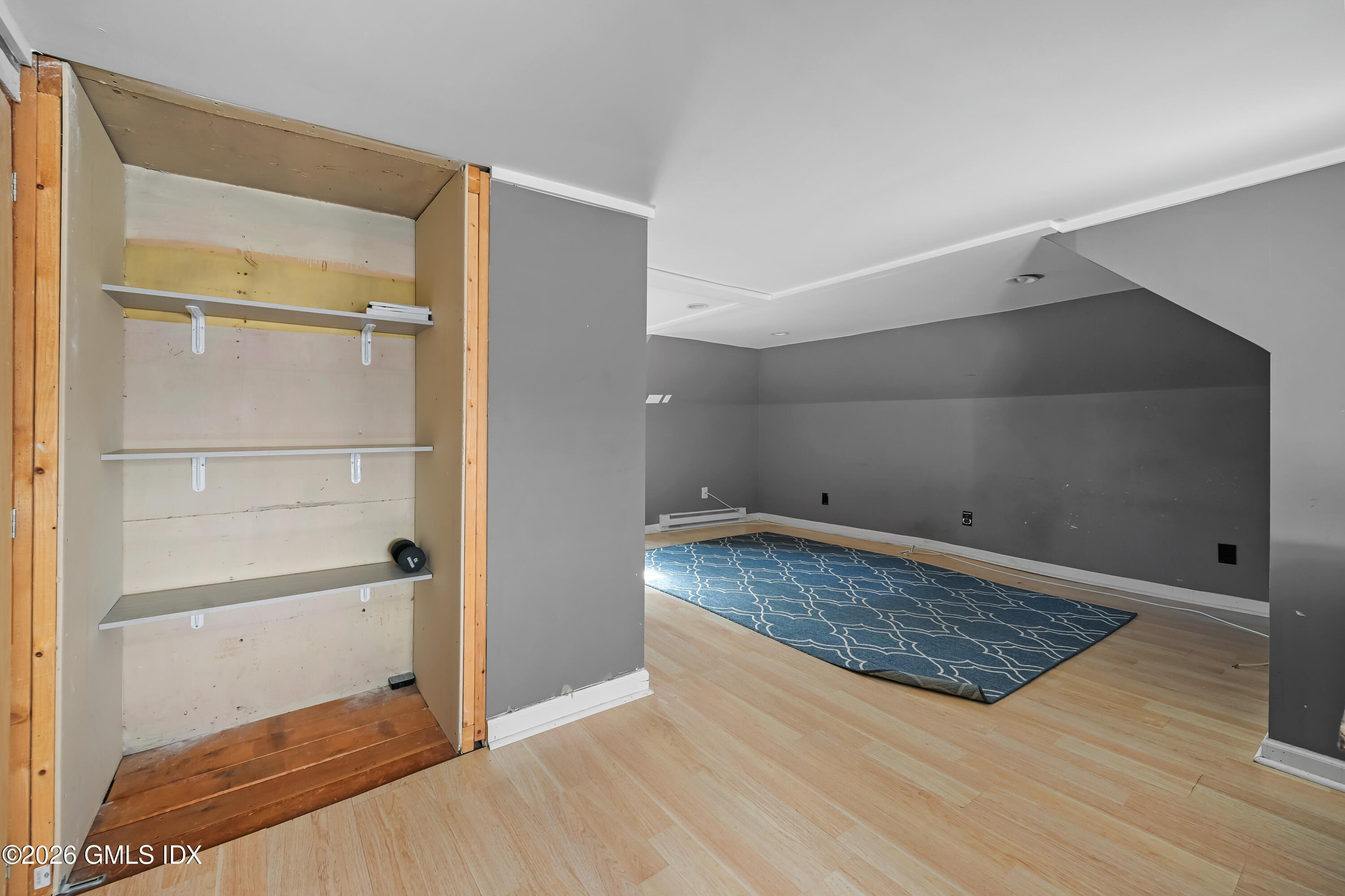 11 Bible Street Cos Cob, CT 06807 - Photo 20 of 25 a view of a room with wooden floor and cabinet