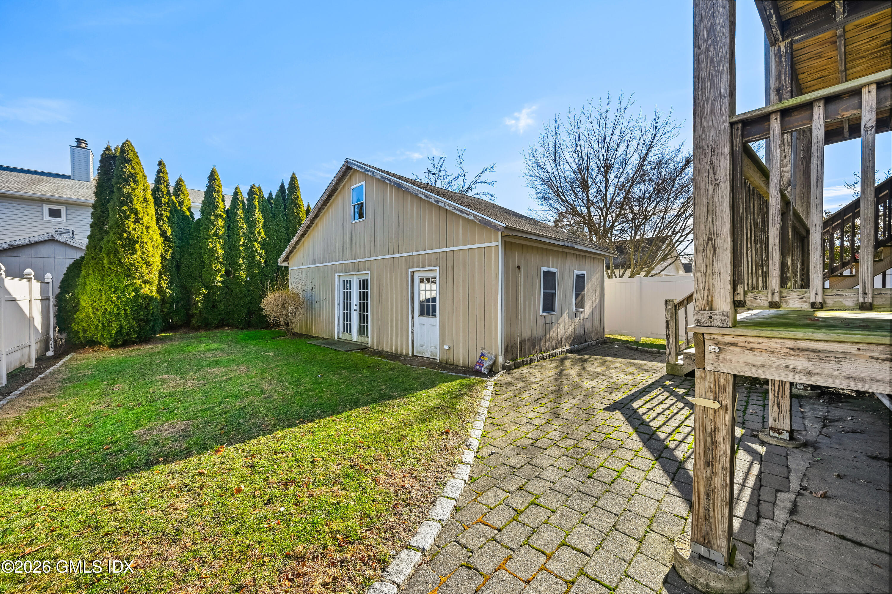 11 Bible Street Cos Cob, CT 06807 - Photo 21 of 25 a view of a house with a patio