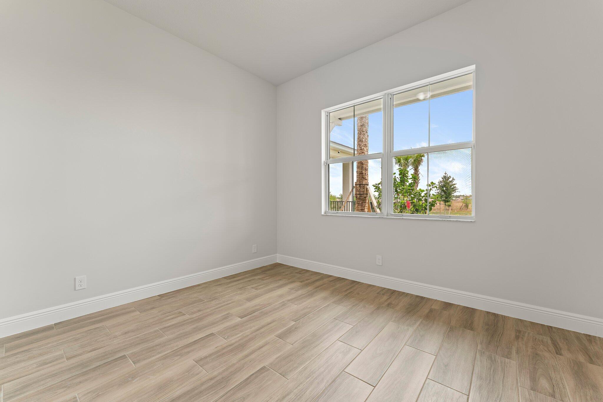 12622 Nautilus Circle Palm Beach Gardens, FL 33412 - Photo 20 of 66 an empty room with a window