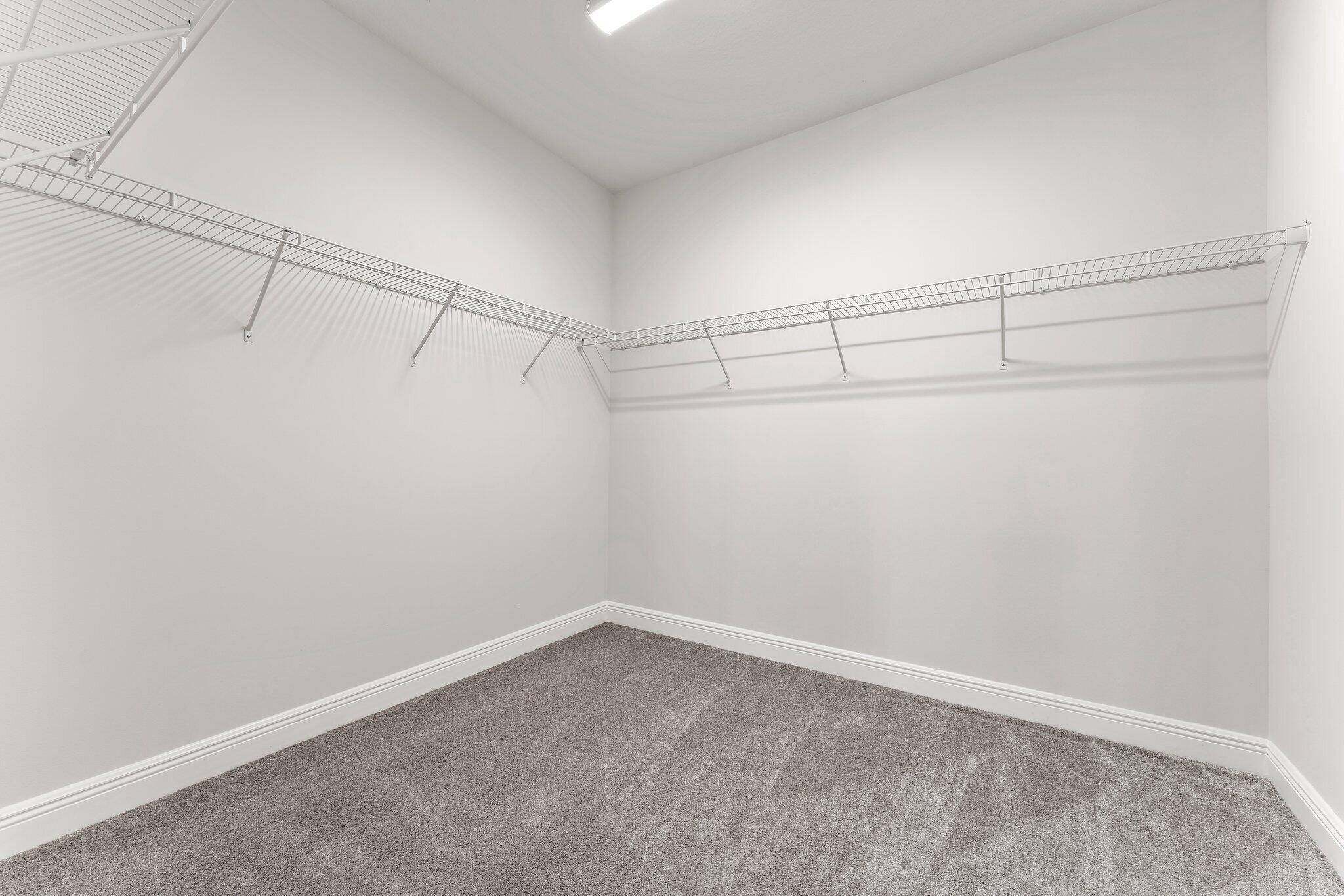 12622 Nautilus Circle Palm Beach Gardens, FL 33412 - Photo 33 of 66 a view of a room with racks on the wall