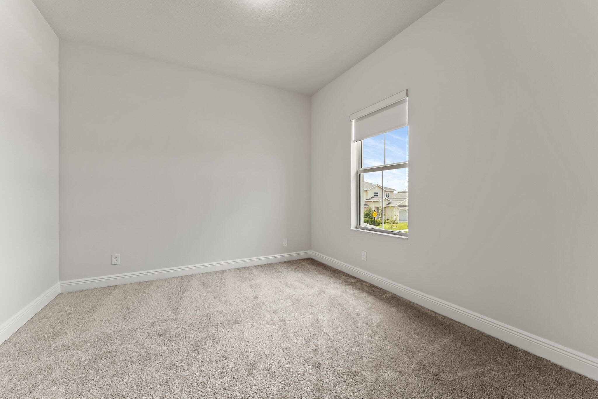 12622 Nautilus Circle Palm Beach Gardens, FL 33412 - Photo 35 of 66 an empty room with a window