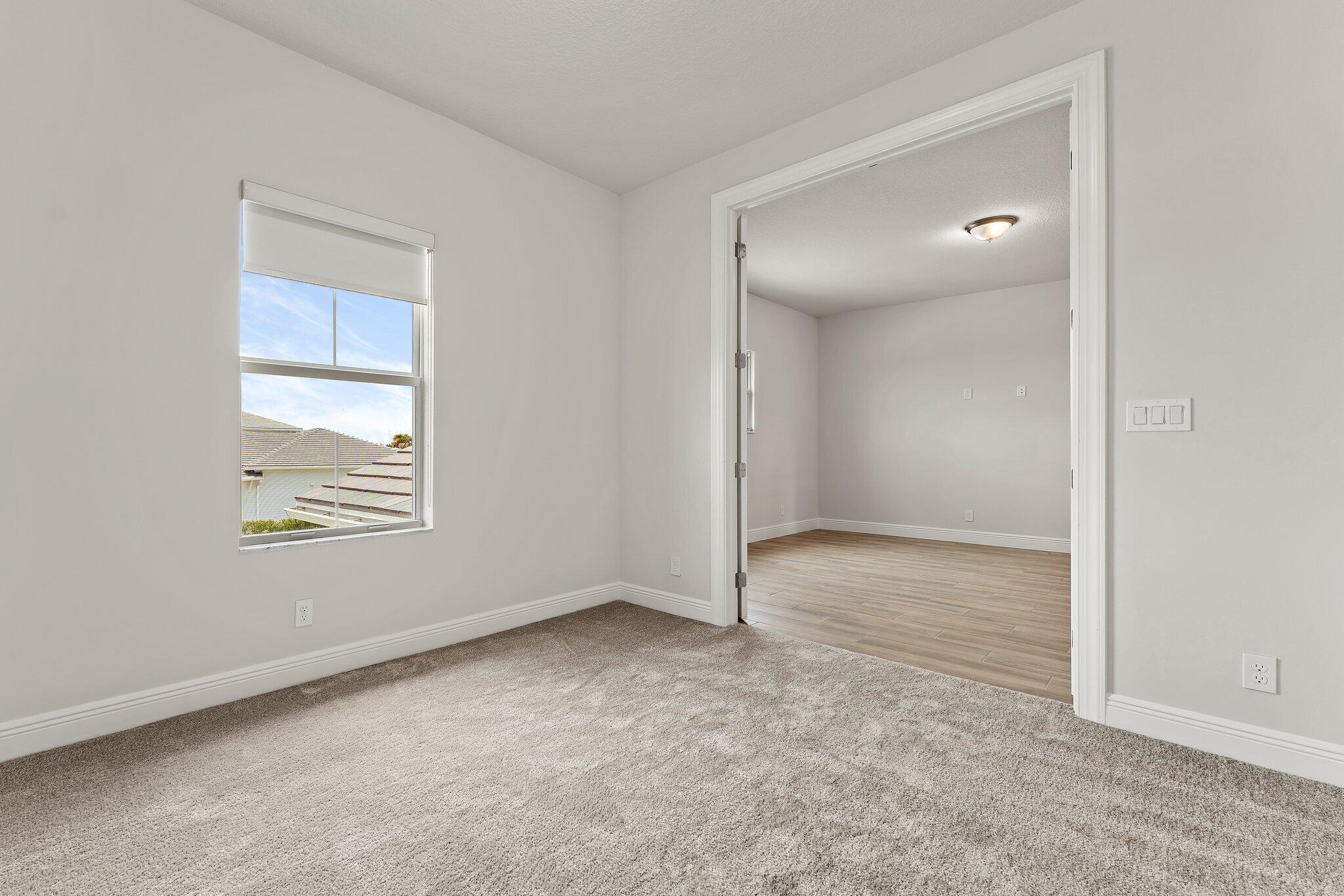 12622 Nautilus Circle Palm Beach Gardens, FL 33412 - Photo 36 of 66 a view of an empty room with a window