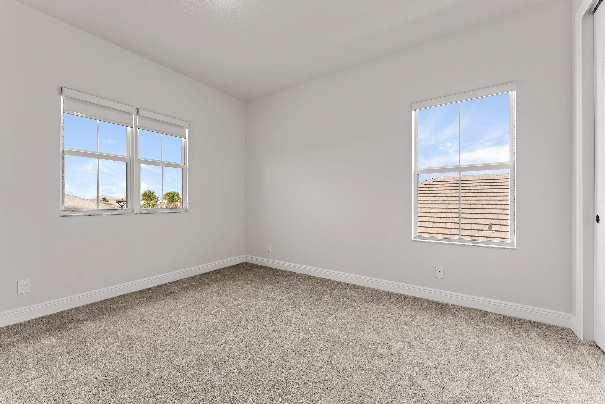 12622 Nautilus Circle Palm Beach Gardens, FL 33412 - Photo 37 of 66 an empty room with a window