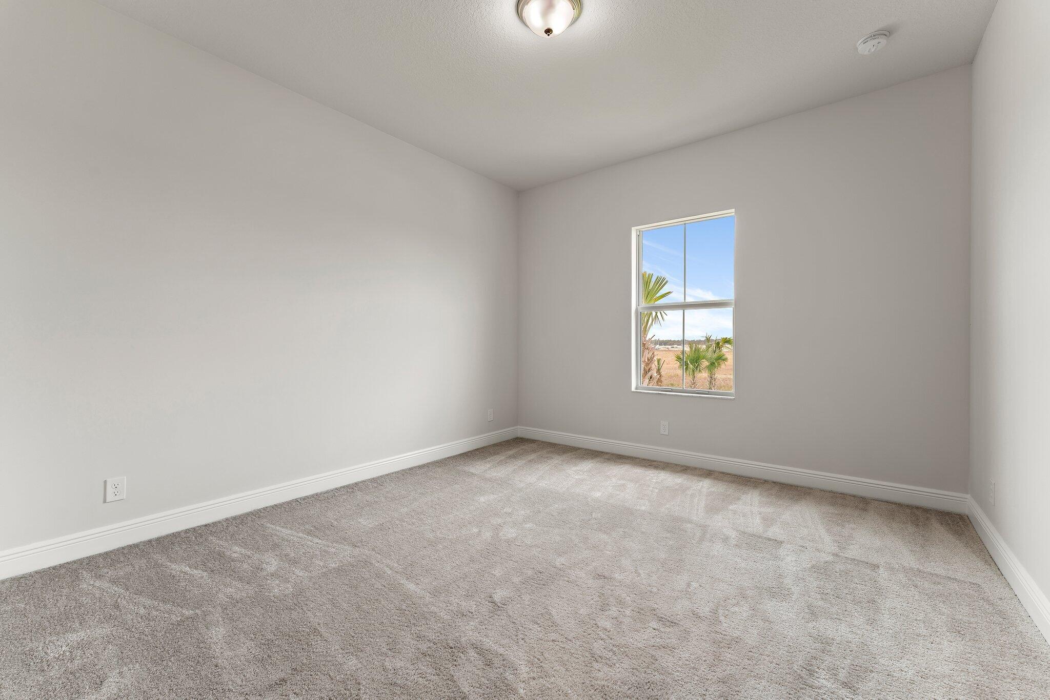 12622 Nautilus Circle Palm Beach Gardens, FL 33412 - Photo 40 of 66 an empty room with windows