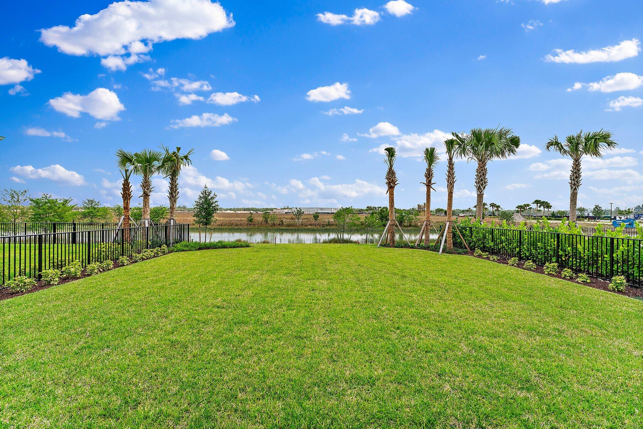 12622 Nautilus Circle Palm Beach Gardens, FL 33412 - Photo 45 of 66 a view of a green field