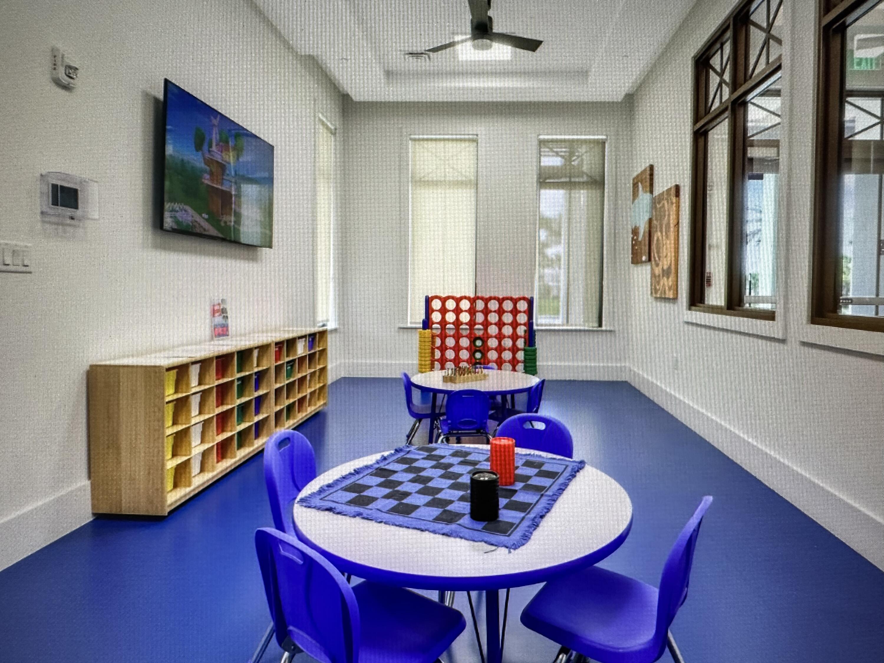 12622 Nautilus Circle Palm Beach Gardens, FL 33412 - Photo 52 of 66 a living room with furniture and wooden floor