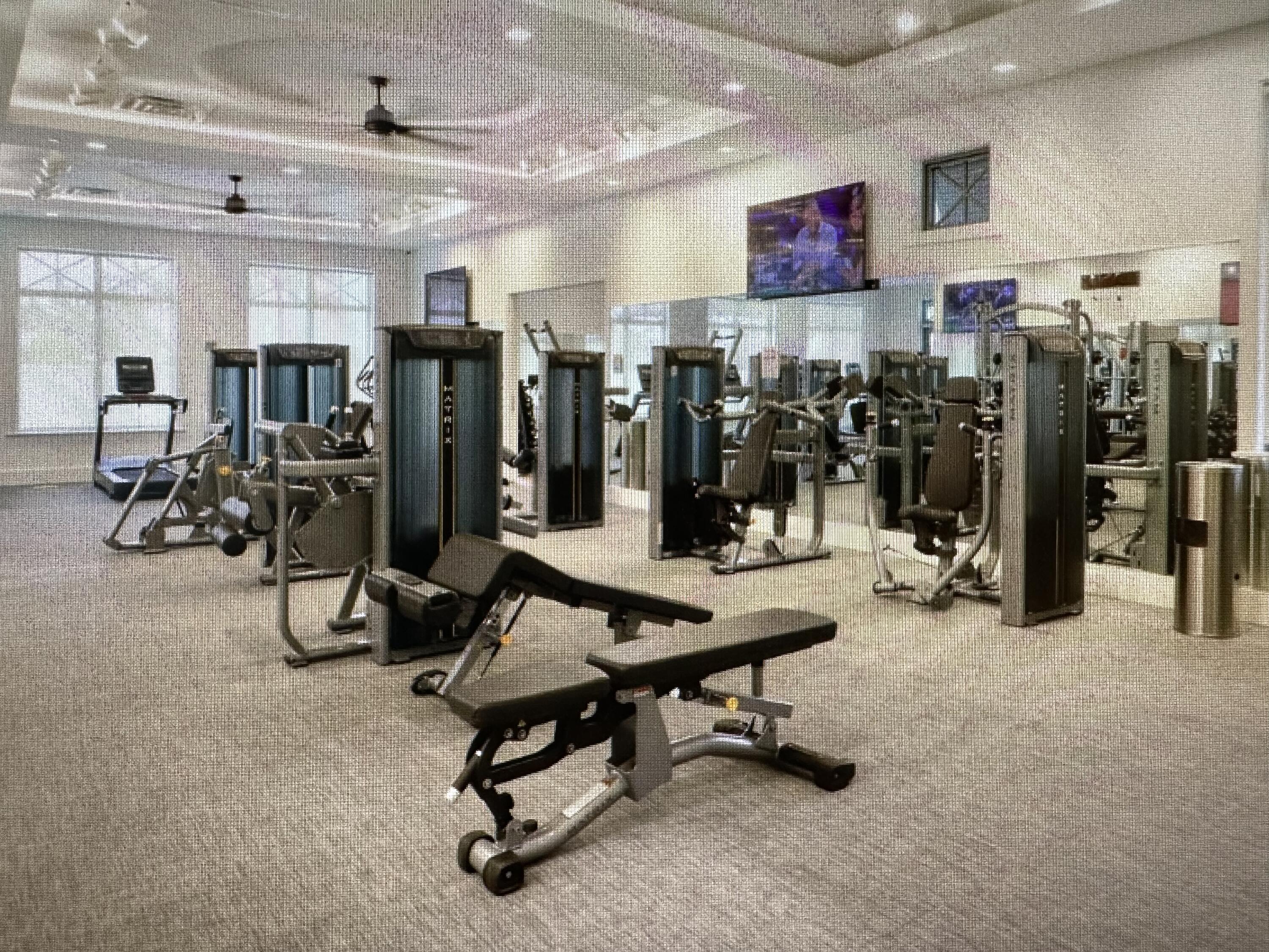 12622 Nautilus Circle Palm Beach Gardens, FL 33412 - Photo 53 of 66 a view of a room with gym equipment