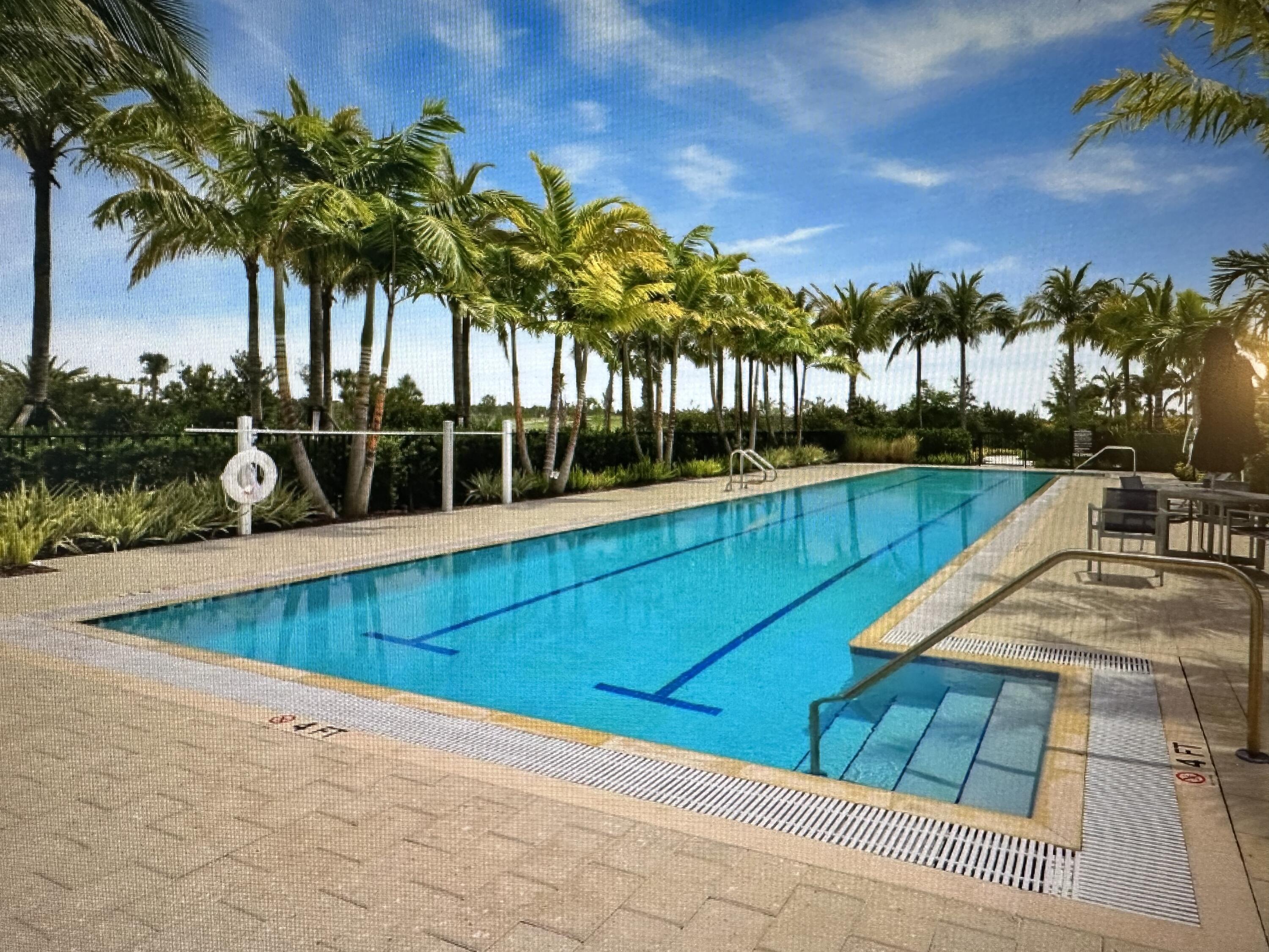 12622 Nautilus Circle Palm Beach Gardens, FL 33412 - Photo 61 of 66 a view of swimming pool with a patio